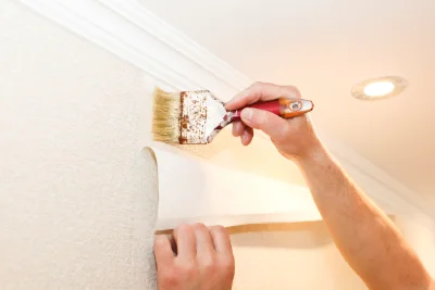 Pose de papier peint à Lajoux — revêtements muraux et toiles de verre